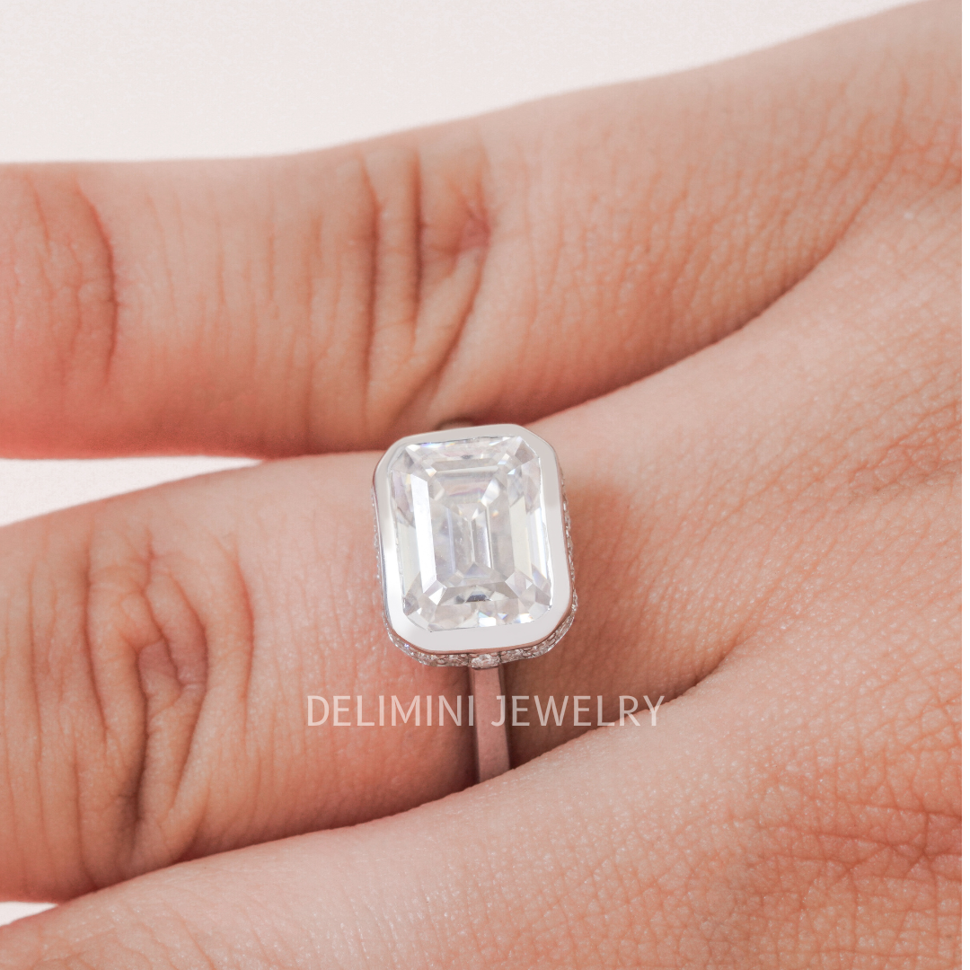 Bezel Setting East West Emerald Cut Solitaire Ring