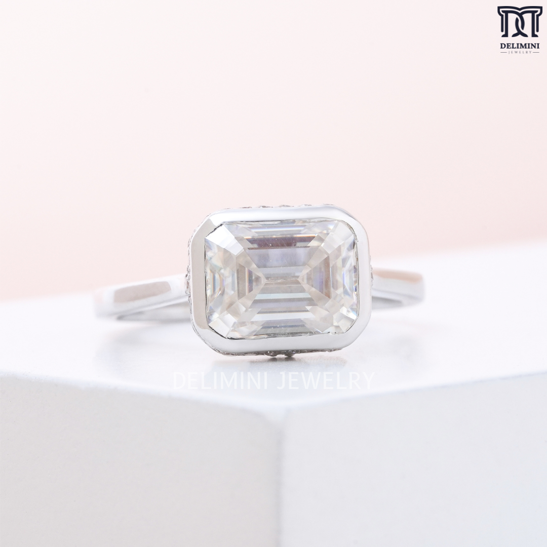 Bezel Setting East West Emerald Cut Solitaire Ring