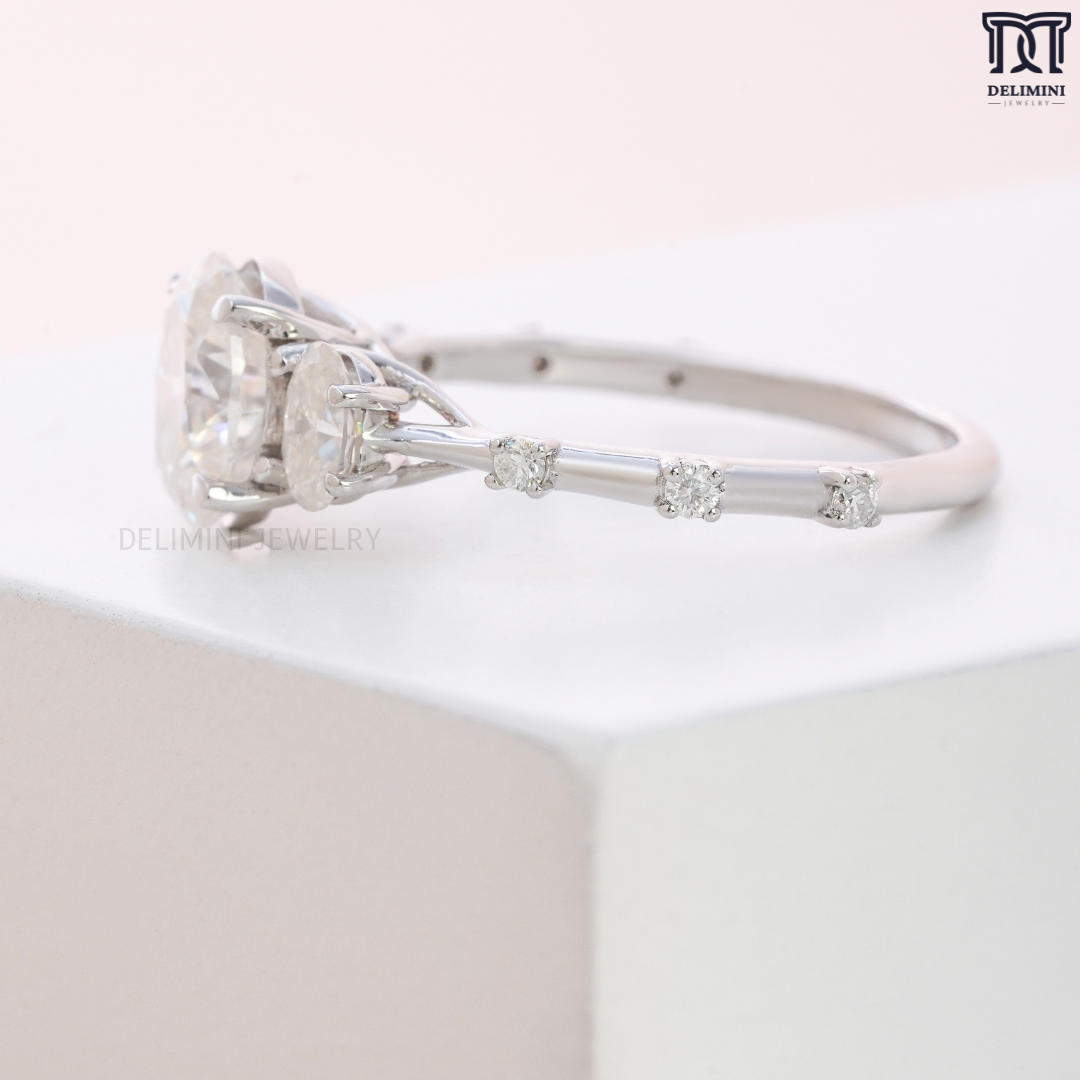 Past Present Future Three Stone Oval Cut Diamond Ring